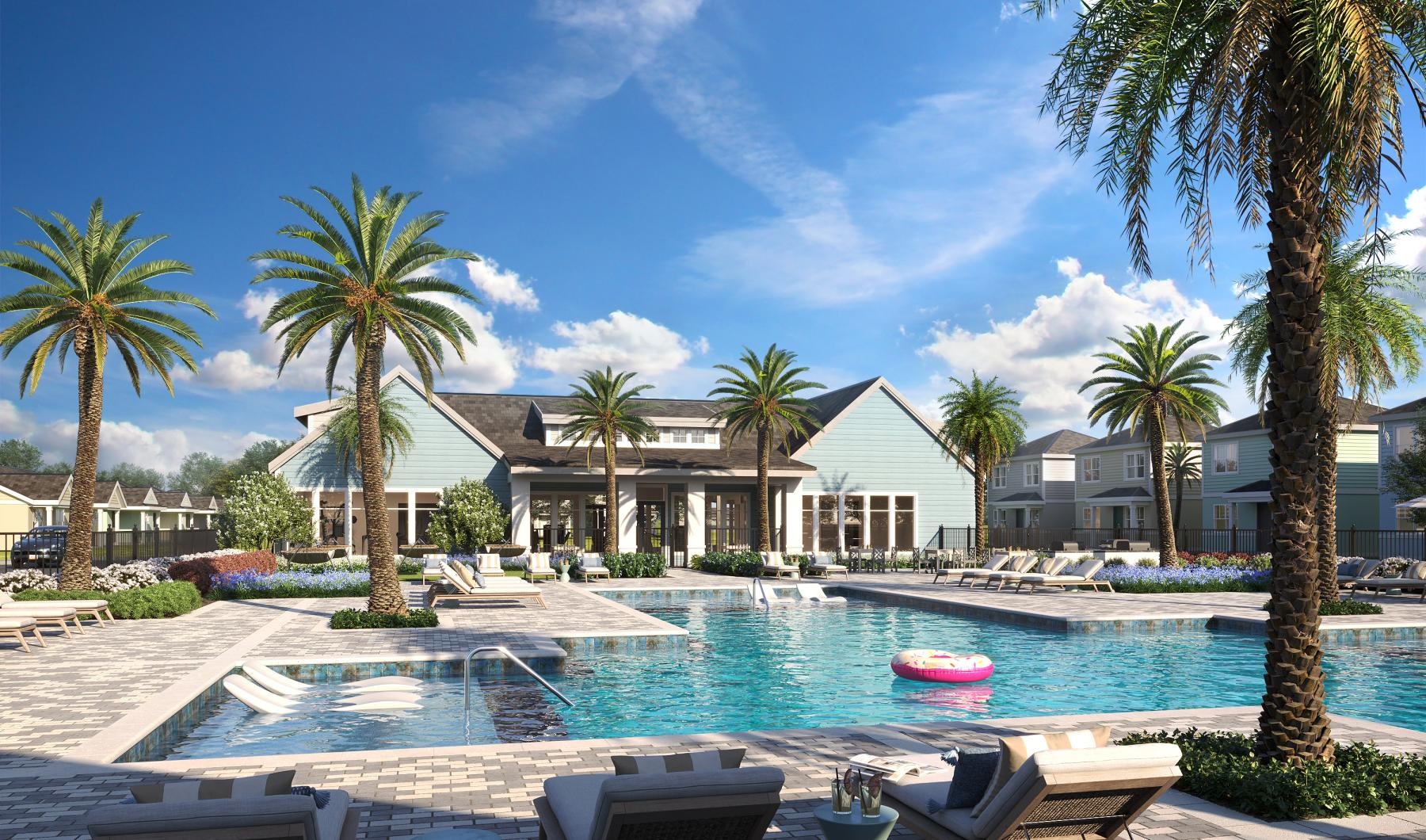 a pool with palm trees and a building in the background