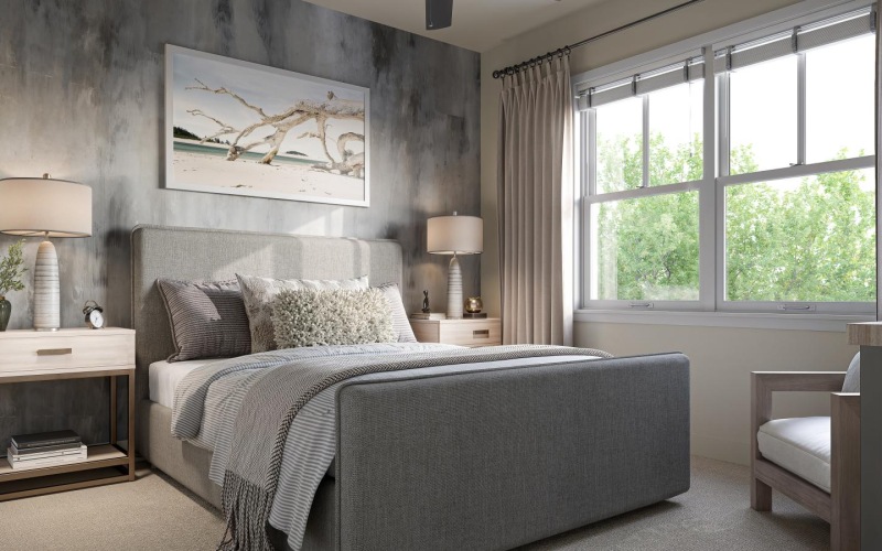 a bedroom with a bed and a fan