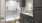 a bathroom with a shower and sink